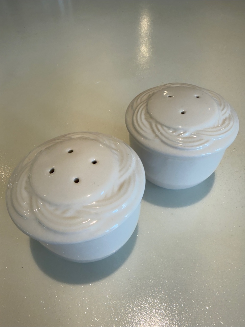 White Pfaltzgraff Ceramic Salt and Pepper Shakers - Swirl Detail